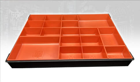 Orange and black organizer laid flat with no lid